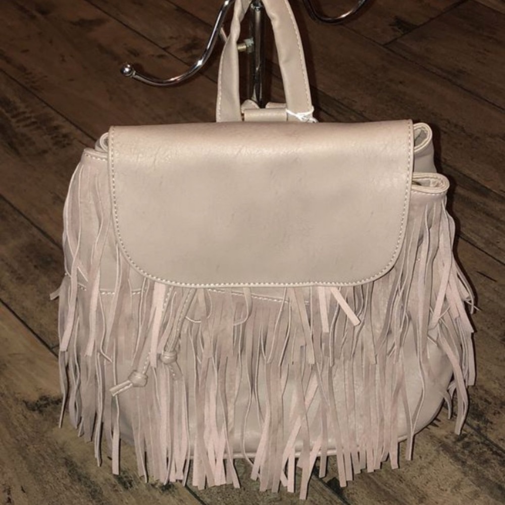Fringe faux leather backpack